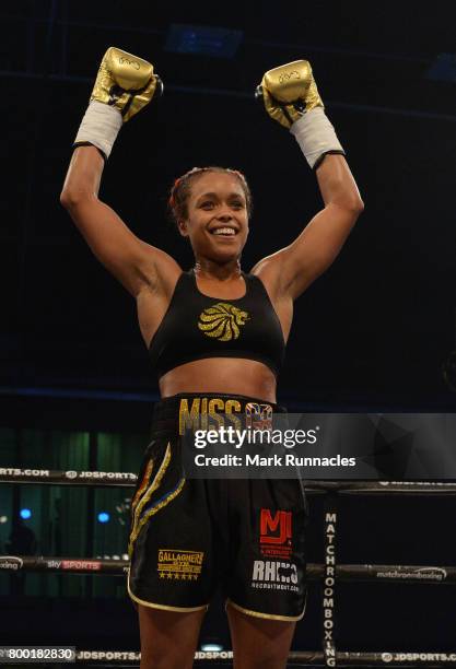 Natasha Jonas celebrates after beating Monika Antonik during a Super-Featherweight contest presented by Matchroom Boxing at Walker Activity Dome on...