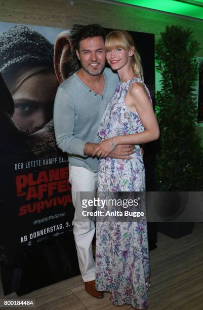Tobey Wilson and Sabrina Gehrmann attend the 'Planet der Affen: Survival' special screening at Astor Film Lounge on June 23, 2017 in Berlin, Germany.