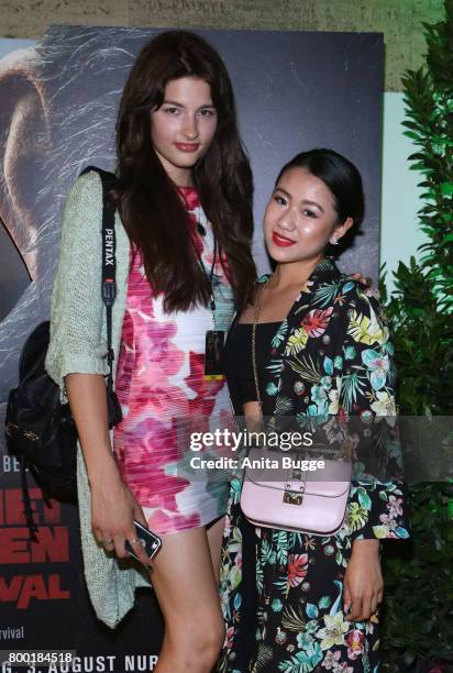 Melina Budde and Ting Ting attend the 'Planet der Affen: Survival' special screening at Astor Film Lounge on June 23, 2017 in Berlin, Germany.