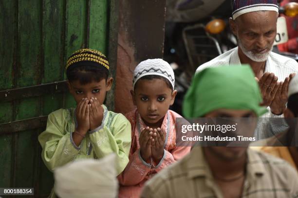 Muslims offering Namaz on the occasion of Last friday of Ramzan at sector 8 Masjid, on June 23, 2017 in Noida, India.