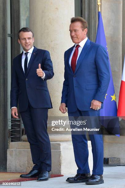French President Emmanuel Macron receives Arnold Schwarzenegger at the Elysee Palace on June 23, 2017 in Paris, France. On their agenda was the...