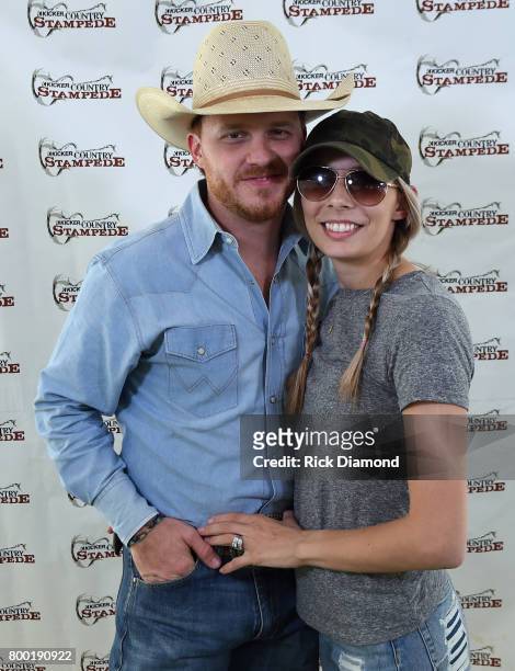 Singer/Songwriter Cody Johnson and his wife Brandi Johnson backstage during Kicker Country Stampede - Day 2 at Tuttle Creek State Park on June 23,...