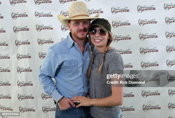 Singer/Songwriter Cody Johnson and his wife Brandi Johnson backstage during Kicker Country Stampede - Day 2 at Tuttle Creek State Park on June 23,...