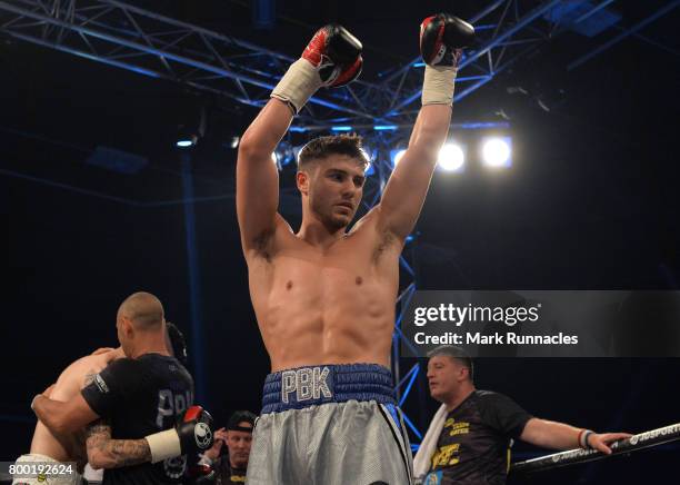 Josh Kelly celebrates after beating Tom Whitfield during a Welterweight contest presented by Matchroom Boxing at Walker Activity Dome on June 23,...