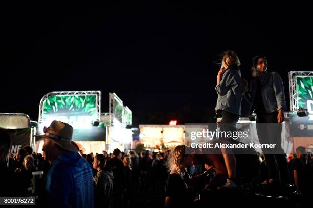 Festival goer stand high during the Hurricane Festival 2017 on June 23, 2017 in Scheessel, Germany. The gates of the festival have officially opened...