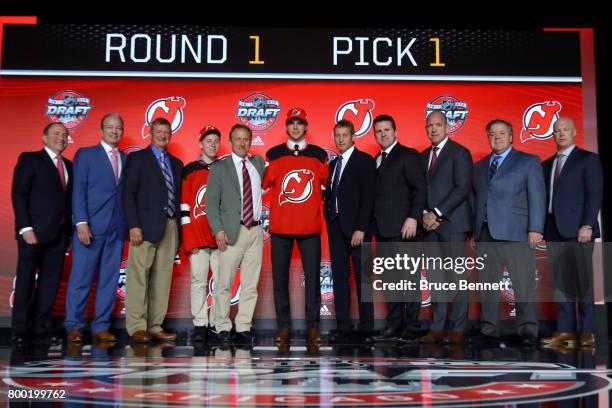 Nico Hischier poses after being selected first overall by the New Jersey Devils during the 2017 NHL Draft at the United Center on June 23, 2017 in...