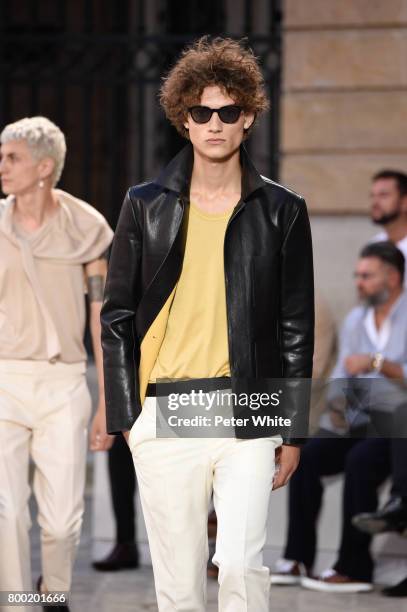 Erge Rigvava walks the runway during the Berluti Menswear Spring/Summer 2018 show as part of Paris Fashion Week on June 23, 2017 in Paris, France.