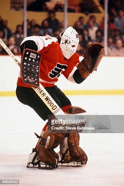 Bernie Parent of the Philadelphia Flyers tends goal in game against the Boston Bruins at Boston Garden.