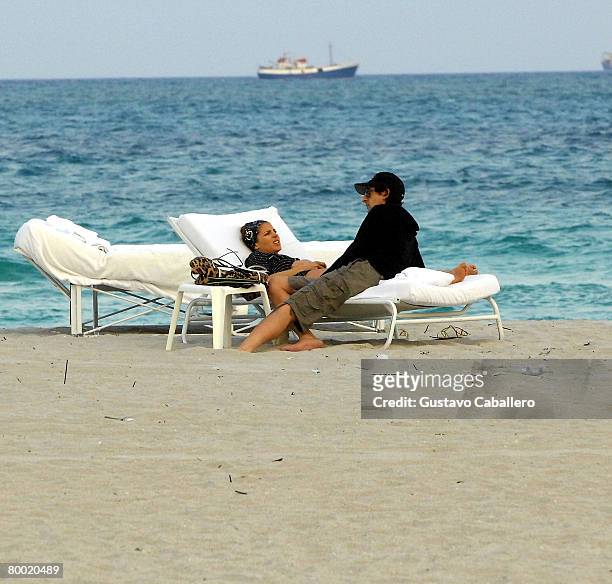 Actor Adrien Brody and his girlfriend Elsa Pataky sit in South Beach at sunset February 26, 2008 in Miami Beach, Florida.