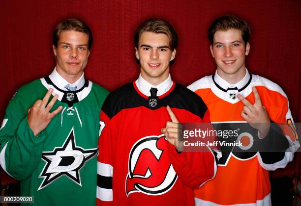 Miro Heiskanen, third overall pick of the Dallas Stars, Nico Hischier, first overall pick of the New Jersey Devils, and Nolan Patrick, second overall...