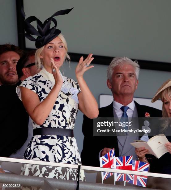 Holly Willoughby and Phillip Schofield watch the racing as they attend day 4 of Royal Ascot at Ascot Racecourse on June 23, 2017 in Ascot, England.