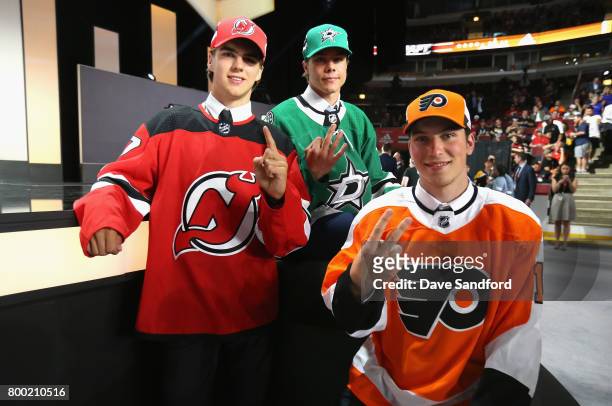 Nico Hischier, first overall pick of the New Jersey Devils, Miro Heiskanen, third overall pick of the Dallas Stars, and Nolan Patrick, second overall...