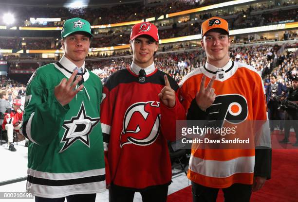 Miro Heiskanen, third overall pick of the Dallas Stars, Nico Hischier, first overall pick of the New Jersey Devils, and Nolan Patrick, second overall...