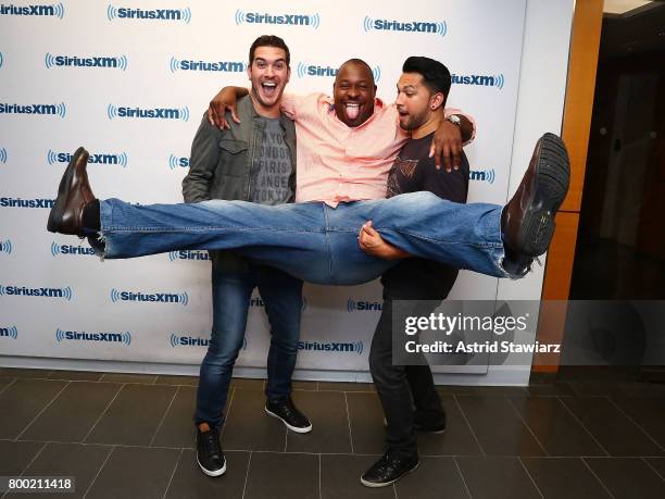 SiriusXM hosts Rich Davis and Steve Covino pose with Black Ice during DudeBro Convention 2017 at SiriusXM Studios on June 23, 2017 in New York City.