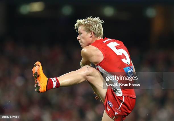 Isaac Heeney of the Swans kicks during the round 14 AFL match between the Sydney Swans and the Essendon Bombers at Sydney Cricket Ground on June 23,...