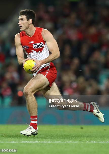 Dean Towers of the Swans looks upfield during the round 14 AFL match between the Sydney Swans and the Essendon Bombers at Sydney Cricket Ground on...