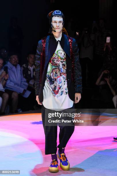 Model walks the runway during the Comme Des Garcons Homme Plus Menswear Spring/Summer 2018 show as part of Paris Fashion Week on June 23, 2017 in...