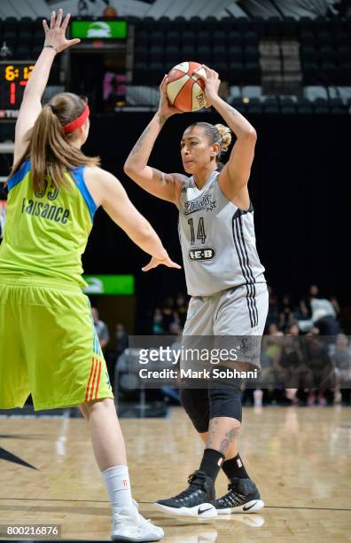 Erika de Souza of the San Antonio Stars passes the ball against the Dallas Wings during the game on June 23, 2017 at the AT&T Center in San Antonio,...