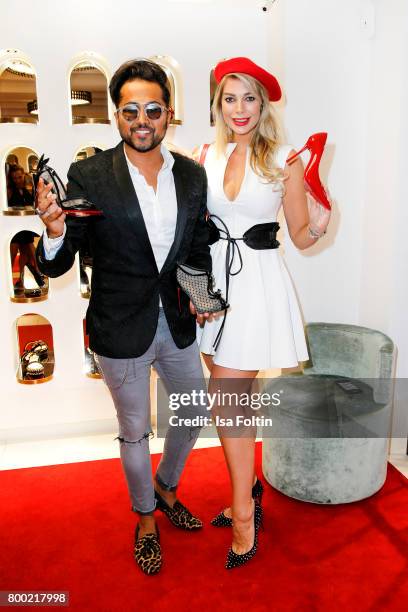 Stylist Samuel Sohebi and model Annika Gassner during the Christian Louboutin Store Opening on June 23, 2017 in Munich, Germany.