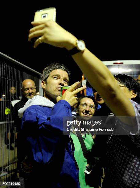 Noel Gallagher poses backstage on day 2 of the Glastonbury Festival 2017 at Worthy Farm, Pilton on June 23, 2017 in Glastonbury, England.