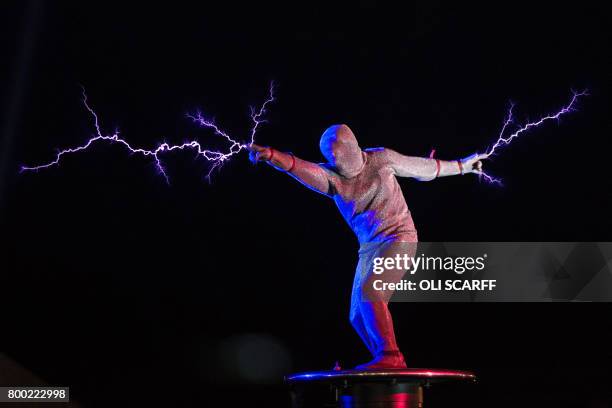 One of the 'Lords of Lightning' harnesses high-voltage electricity in a performance during the Metamorphosis Show in the Arcadia area at the...