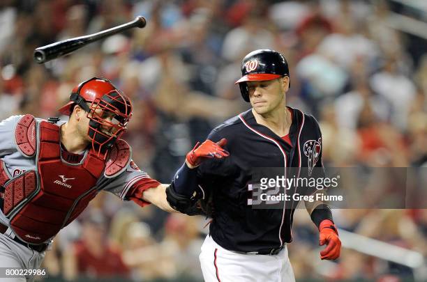 Matt Wieters of the Washington Nationals is tagged out by Devin Mesoraco of the Cincinnati Reds after striking out in the ninth inning at Nationals...