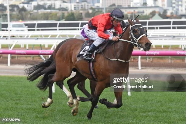 Encosta Line ridden by Damien Oliver wins the Grampians Region Handicap at Flemington Racecourse on June 24, 2017 in Flemington, Australia.