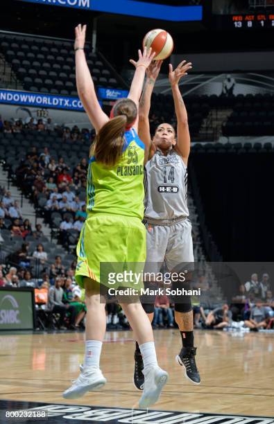 Erika de Souza of the San Antonio Stars shoots the ball against the Dallas Wings during the game on June 23, 2017 at the AT&T Center in San Antonio,...