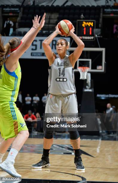 Erika de Souza of the San Antonio Stars passes the ball against the Dallas Wings during the game on June 23, 2017 at the AT&T Center in San Antonio,...