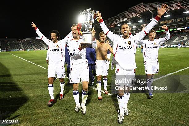 Carey Talley and Chris Wingert of Real Salt Lake show the Rocky Mountain Cup to the fans after the game against the Colorado Rapids at Dick's...