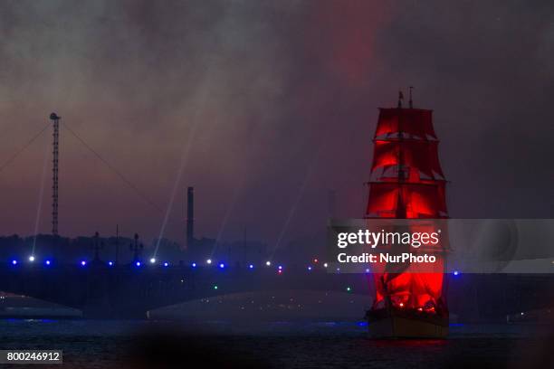 Sweden's brig Tre Kronor with scarlet sails floats on the Neva River during the Scarlet Sails festivities marking school graduation, in St....