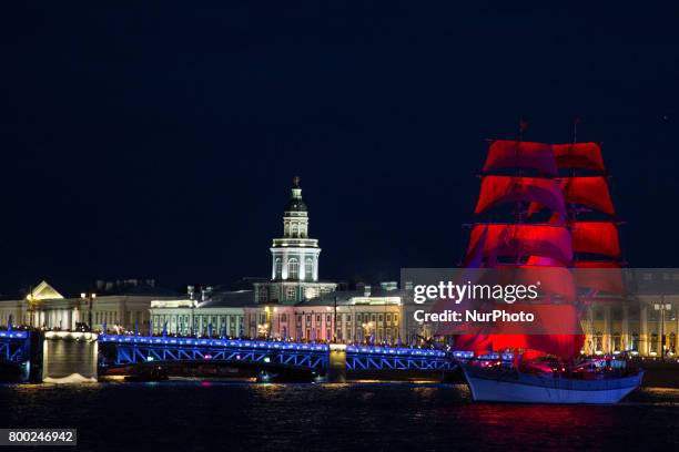 Sweden's brig Tre Kronor with scarlet sails floats on the Neva River during the Scarlet Sails festivities marking school graduation, in St....