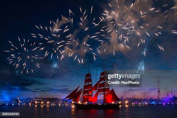 Sweden's brig Tre Kronor with scarlet sails floats on the Neva River during the Scarlet Sails festivities marking school graduation, in St....