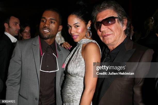 Singer Kanye West with his wife and Roberto Cavalli attend the Cavalli Party at Crazy Horse on February 26, 2008 in Paris, France.