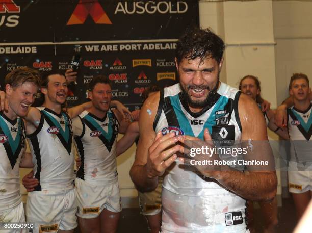 Paddy Ryder of the Power celebrates his 200th match and his teams win over the Magpies during the round 14 AFL match between the Collingwood Magpies...