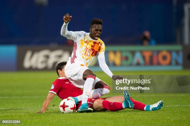 Inaki Williams of Spain tackled by Sasa Lukic of Serbia during the UEFA European Under-21 Championship 2017 Group B match between Serbia and Spain at...