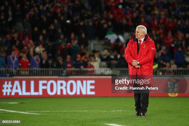 Warren Gatland the head coach of the Lions looks on as his team warm up prior to kickoff during the first test match between the New Zealand All...