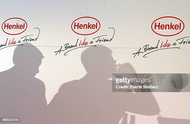 Shadows of the managers of Henkel KGaA pictured during their 2007 results news conference on February 27, 2008 in Duesseldorf, Germany. The...