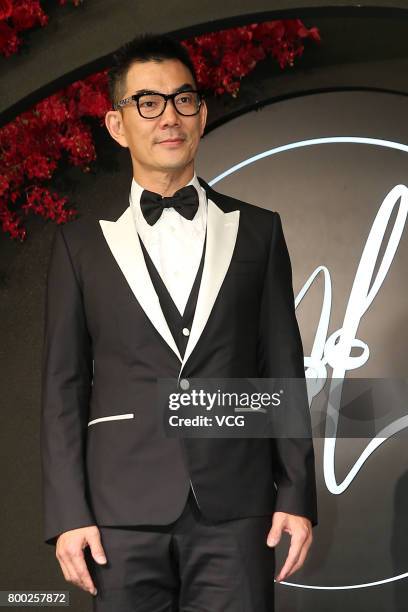 Singer Richie Jen arrives at the red carpet of the banquet held by Macau businessman Levo Chan and actress Ady An on June 23, 2017 in Taipei, Taiwan...