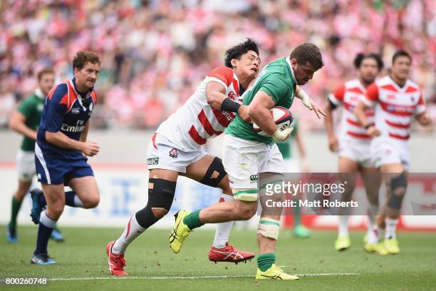 Sean Reidy of Ireland makes a break to score a try during the international rugby friendly match between Japan and Ireland at Ajinomoto Stadium on...
