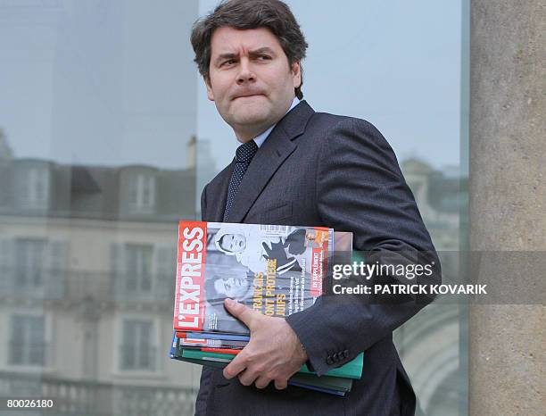 France's president Nicolas Sarkozy's communication adviser Franck Louvrier leaves the presidential Elysee Palace after attending the weekly cabinet...