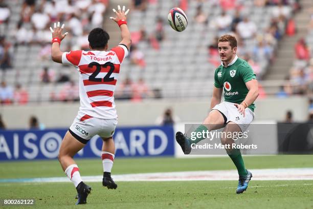 Paddy Jackson of Ireland kicks under pressure during the international rugby friendly match between Japan and Ireland at Ajinomoto Stadium on June...