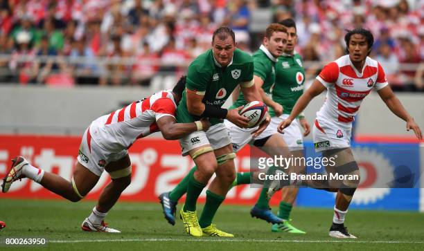 Tokyo , Japan - 24 June 2017; Rhys Ruddock of Ireland is tackled by Amanaki Mafi of Japan during the international rugby match between Japan and...