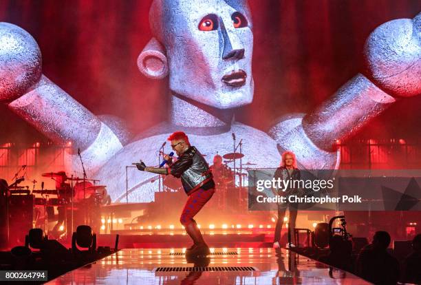 Queen and Adam Lambert perform onstage during the North American Tour kickoff at Gila River Arena on June 23, 2017 in Glendale, Arizona.