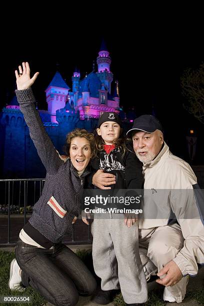 Celine Dion, son Rene-Charles and husband Rene Angeli outside Sleeping Beauty Castle at Disneyland in Anaheim, Calif. On Wednesday night. Dion and...