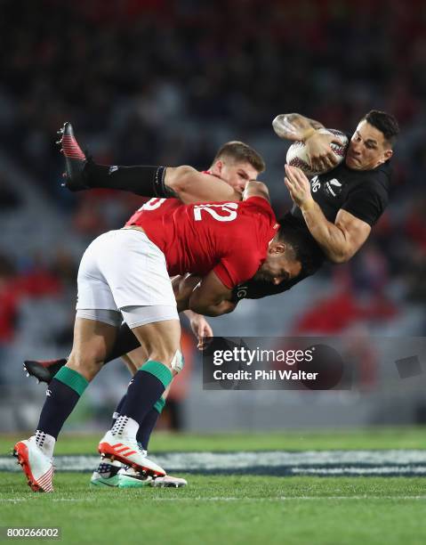 Ben Te'o of the Lions tackles Sonny Bill Williams of the All Blacks during the first test match between the New Zealand All Blacks and the British &...