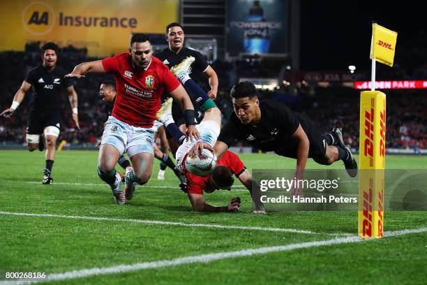 Rieko Ioane of the All Blacks dives in to score a try during the Test match between the New Zealand All Blacks and the British & Irish Lions at Eden...