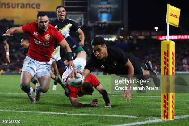 Rieko Ioane of the All Blacks dives over to score his team's second try during the first test match between the New Zealand All Blacks and the...