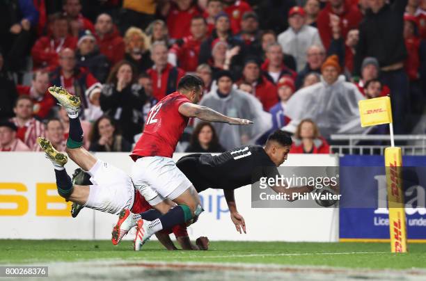 Rieko Ioane of the All Blacks goes over to score his team's second try during the first test match between the New Zealand All Blacks and the British...