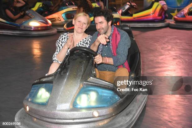 Anna Sherbinina and her compnion attend La Fete des Tuileries on June 23, 2017 in Paris, France.